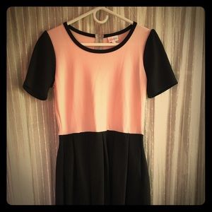 This is a medium LuLaRoe Amelia dress.